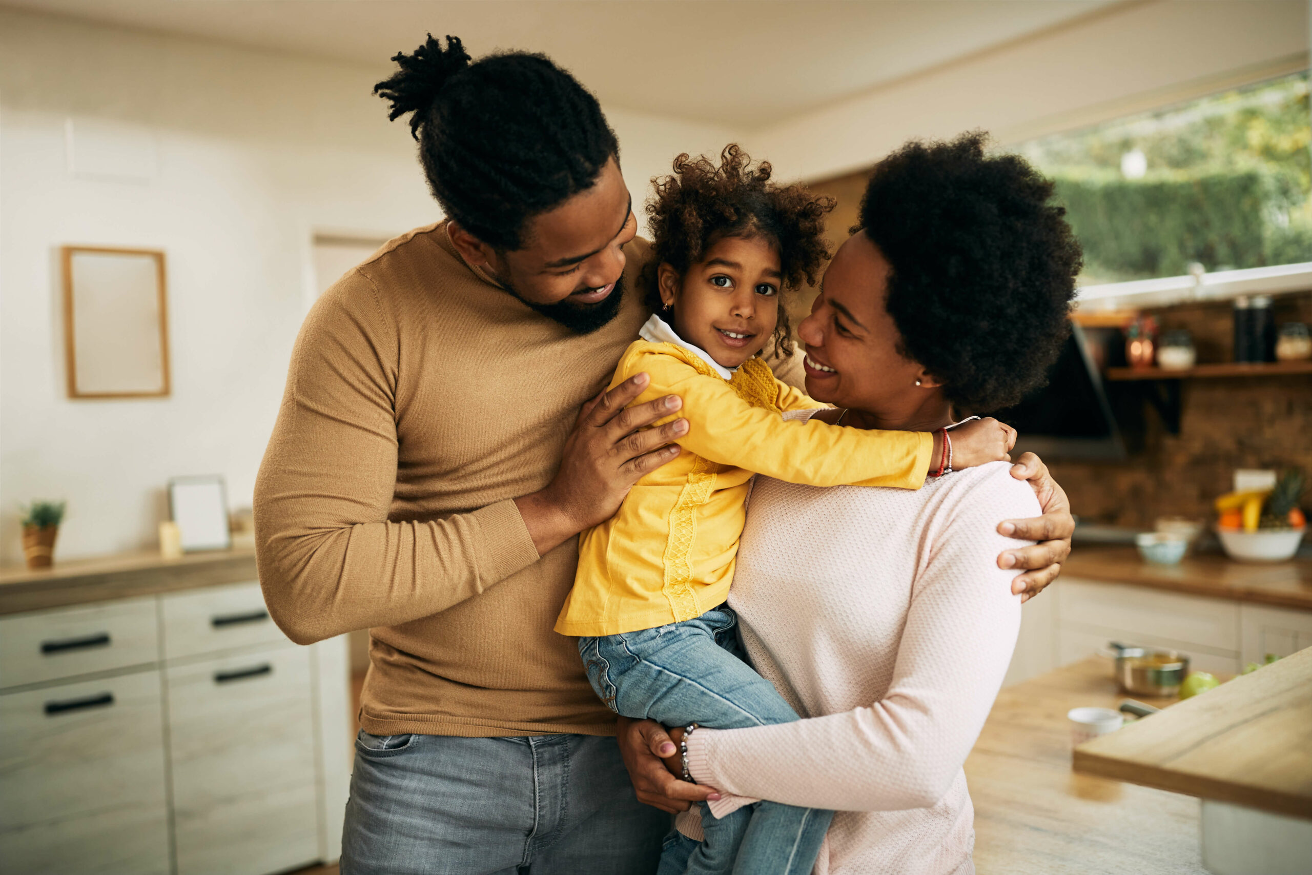 happy-african-american-parents-with-daughter-home (1)